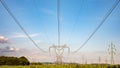 High voltage pylon on skies background, Transmission line tower. Royalty Free Stock Photo