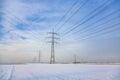 High voltage pylon in wintertime Royalty Free Stock Photo