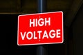 High Voltage Sign - White Letters on Red Background