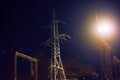 High voltage substation at night.