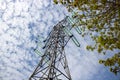 High voltage tower on blue sky background. Silhouette High voltage electric tower. High voltage post or Electricity pole. Royalty Free Stock Photo