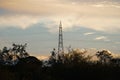 High voltage tower electric line cable with landscape nature trees in sunset time, Electric power lines Silhouette Royalty Free Stock Photo