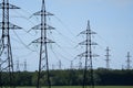 High voltage tower. High voltage. Electricity transmission power lines at sunset (high voltage pylon). Aerial view Royalty Free Stock Photo