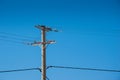 High voltage tower.  electricity wire supply. electrical industry transmission technology against clear blue sky. energy Royalty Free Stock Photo