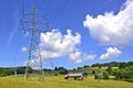 High voltage tower and empty chairlift in a ski resort Royalty Free Stock Photo