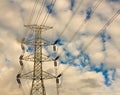 High-voltage tower sky background in cloudy day. Royalty Free Stock Photo
