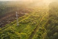 High Voltage towers provide power supply over a long distance. Electricity poles and electric power transmission lines against Royalty Free Stock Photo