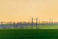 High voltage towers with sky background