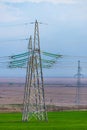 High voltage towers with sky background