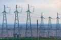 High voltage towers with sky background