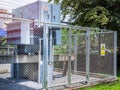 High voltage transformer substation in fence Royalty Free Stock Photo