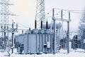 High voltage transformer substation in winter Royalty Free Stock Photo