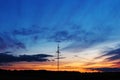 High voltage transmission power lines at sunset