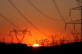 High voltage transmission tower during sunset Royalty Free Stock Photo