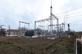 High voltage urban electrical substation with high voltage wires and transformers Royalty Free Stock Photo