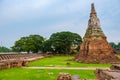 High water at the river in Ayutthaya, Thailand at Wat Chaiwatthanaram during sunset monsoon season Royalty Free Stock Photo