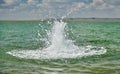 high water splashes on the lake in summer Royalty Free Stock Photo