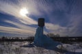 High water tower with a large block of blue ice Royalty Free Stock Photo