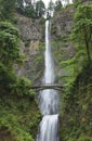 High waterfall with a bridge