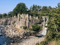 The high waterfall Jeongbang in Jeju island. South Korea Royalty Free Stock Photo