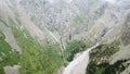 High waterfall among the rocks. View from a drone. Royalty Free Stock Photo