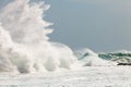 High wave breaking on the rocks Royalty Free Stock Photo
