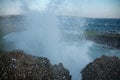 High wave breaking on the rocks Royalty Free Stock Photo