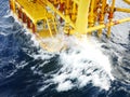 High wave hitting the Boat Landing and Producing Slots at Offshore Platform