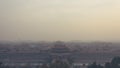 High and wide angle horizontal shot of the Forbidden City in Beijing China, on a foggy day. Royalty Free Stock Photo