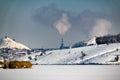 High and wide chimney, a pipe with a large amount of smoke and substances released into the atmosphere. Part of a factory or enter Royalty Free Stock Photo