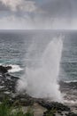 High and wide Eruption of the Spouting Horn in Koloa, Kauai, Hawaii, USA Royalty Free Stock Photo