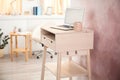 High wooden table with laptop as stand up workplace Royalty Free Stock Photo