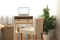 High wooden table with laptop as stand up workplace Royalty Free Stock Photo