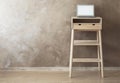 High wooden table with laptop as stand up workplace Royalty Free Stock Photo