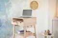 High wooden table with laptop as stand up workplace Royalty Free Stock Photo