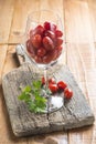 Highball cup with grape tomatoes Royalty Free Stock Photo