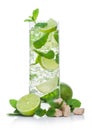 Highball glass of Mojito summer alcoholic cocktail with ice cubes mint and lime on white with cane sugar and raw lime Royalty Free Stock Photo