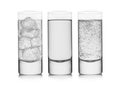 Highball glasses with sparkling and still mineral water drink on white background. With ice cubes and bubbles Royalty Free Stock Photo