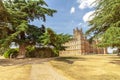 Highclere castle with park and green lebanon cedar Neubury Royalty Free Stock Photo