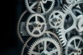 highdetail image of silver clockwork gears against a dark background