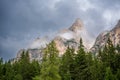 Highest mountain peak near Braies lake in the Dolomites in cloudy day, Italy. Royalty Free Stock Photo
