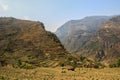 The highest pedestrian pass in the world of Thorong La. The start of trekking around Annapurna - rice fields, green plants, low mo Royalty Free Stock Photo