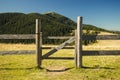 Highland country side village fence and gate wood material landscaping object mountain scenic view background space Royalty Free Stock Photo