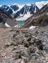 Highland scenery with sharpened stones of unusual shape. Awesome scenic mountain landscape with big cracked pointed stones closeup