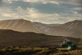 Camper and a tent in a splendid landscape