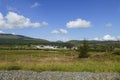 Highlands of Scotland with the whisky Distillery Dalwhinnie in  background Royalty Free Stock Photo