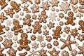 Highlight the charm of the holiday season with a delightful arrangement of gingerbread cookies on a clean white background.