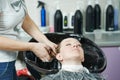 Highlight. woman hair washing in salon Royalty Free Stock Photo