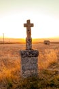 Highlighted cross memorial monument along the side of the road Royalty Free Stock Photo