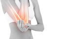 Highlighted elbow pain of woman Royalty Free Stock Photo